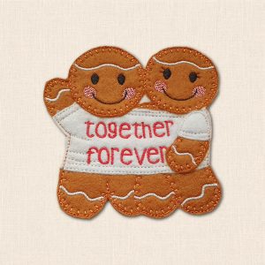 Embroidered felt Mr & Mrs gingerbread couple sharing a white T-shirt with red 'Together Forever' wording, smiling faces and pink cheeks.