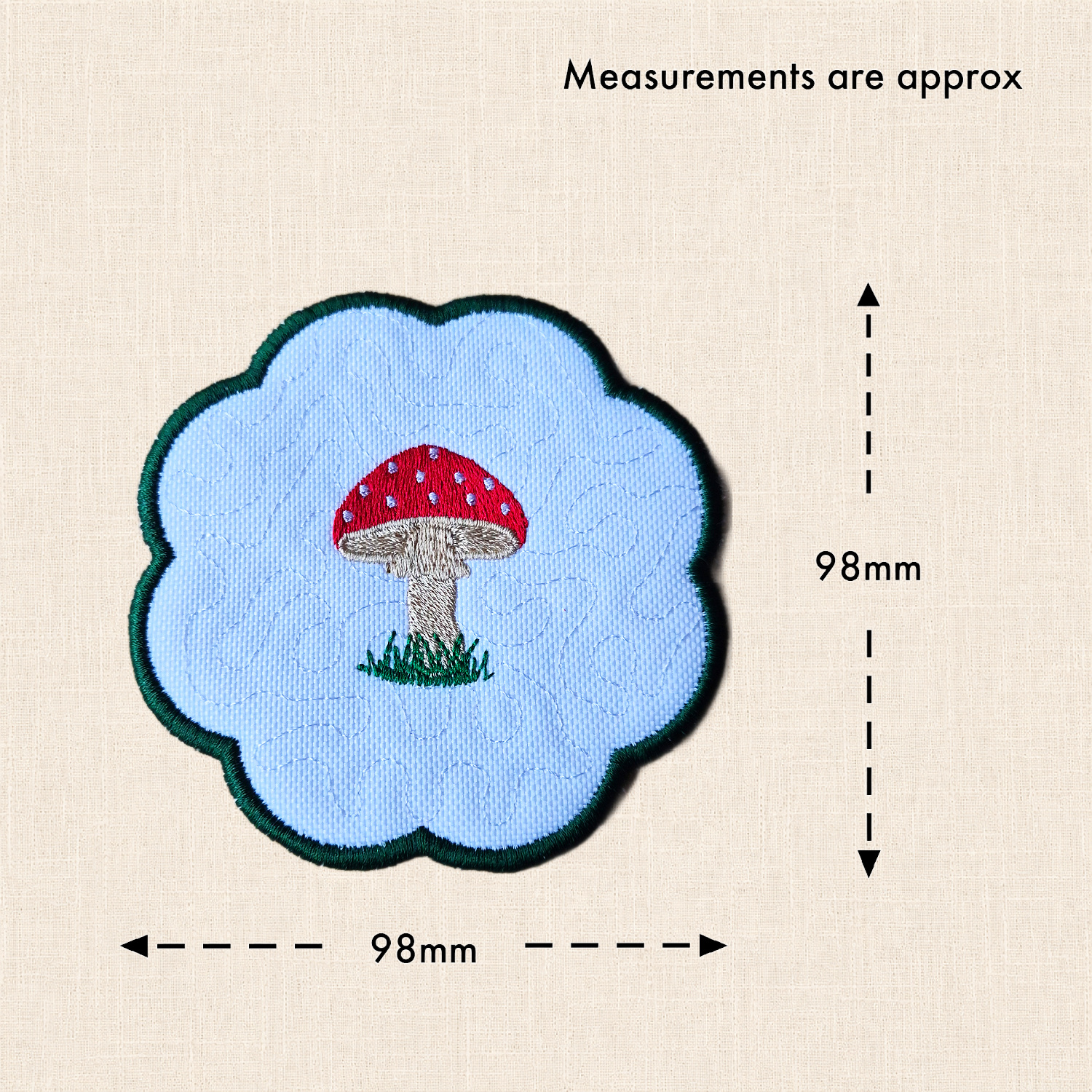 Toadstool candle coaster with measurement arrows showing approximately 98mm wide x 98mm high.