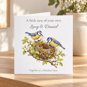 Personalised new home card with watercolour blue tits building a nest, names and address