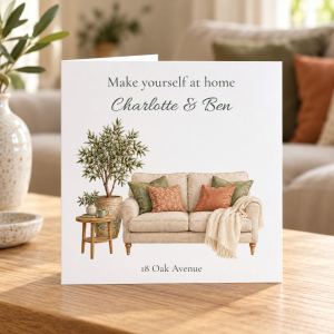 Personalised new home card with watercolour cosy sofa, olive tree, names and address